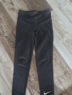Nike Kids Black Performance Leggings with White Swoosh